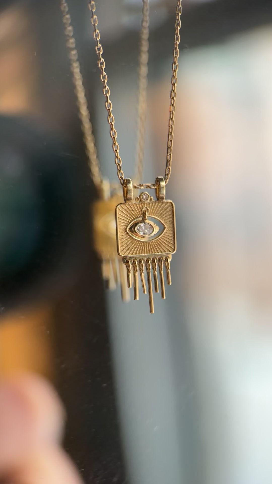 Load and play video in Gallery viewer, Celine Daoust Sunbeams Gold Plate Dangling Eye Necklace
