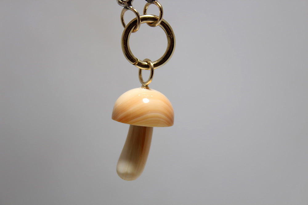 Load image into Gallery viewer, Maura Green Apricot Conch Shell Magic Mushroom Charm
